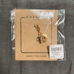 COACH Gold wildflower bag charm